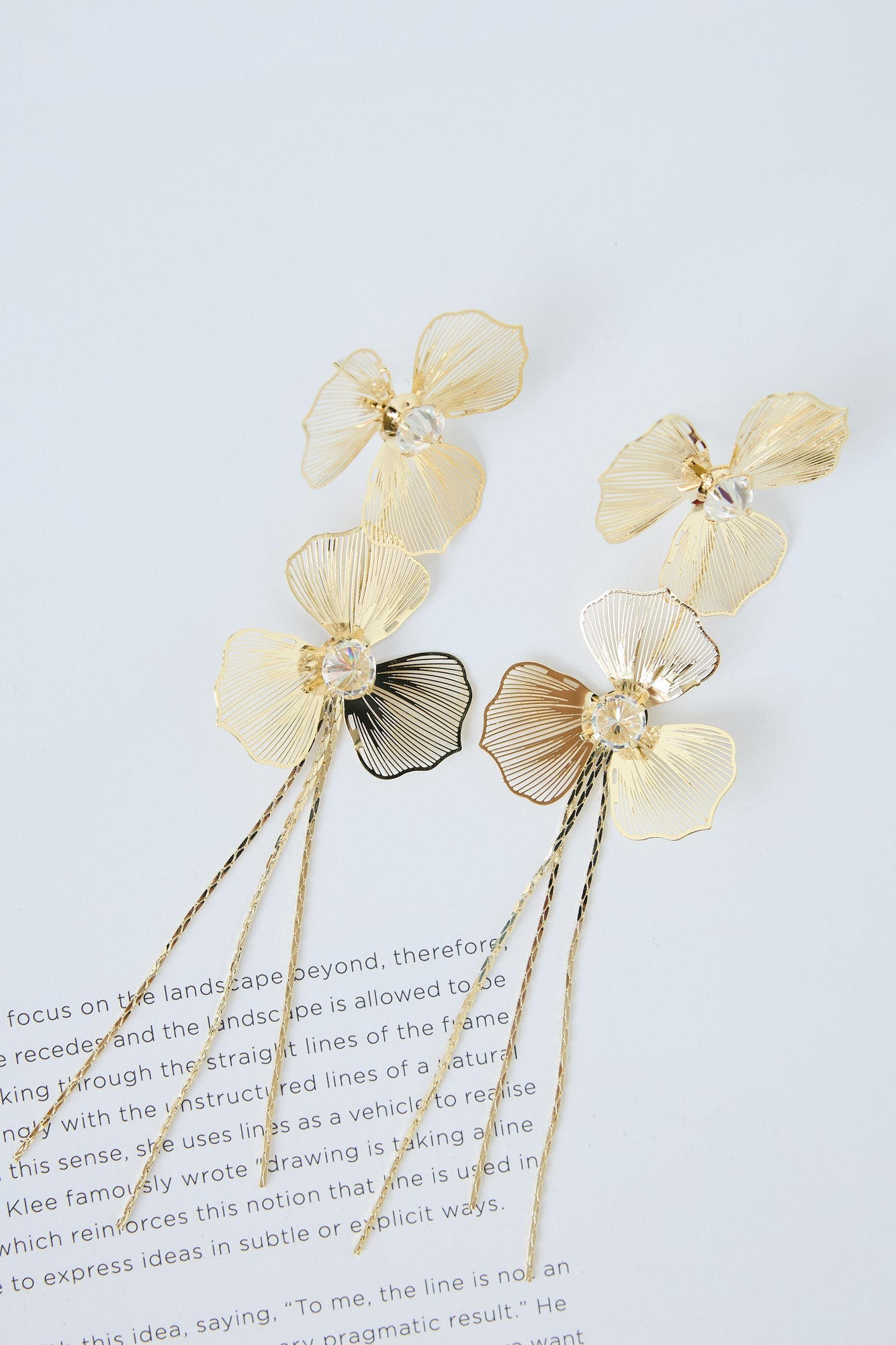 Retreating Earrings Gold