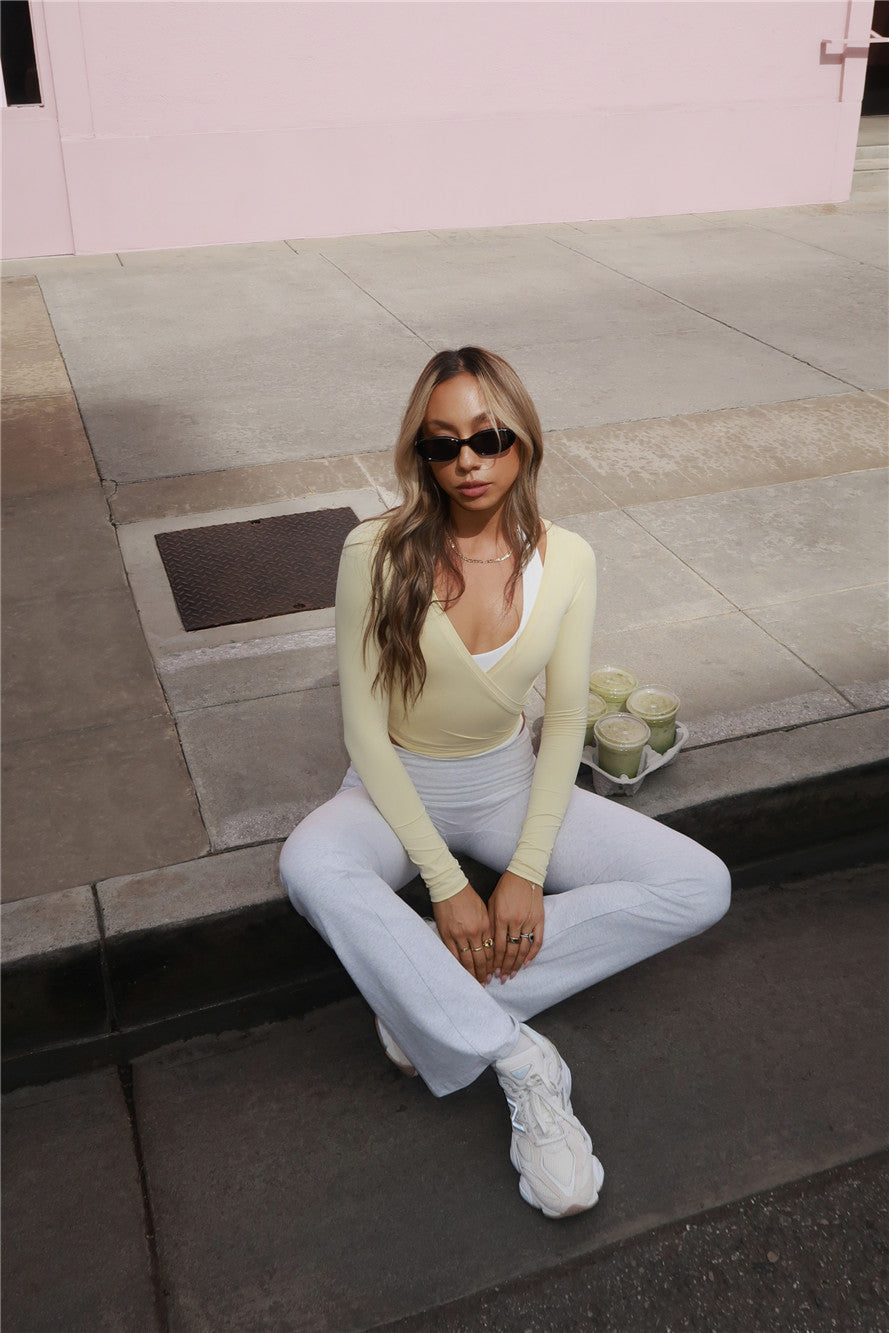 BASE Contour Ballerina Wrap Long Sleeve Crop Top Yellow